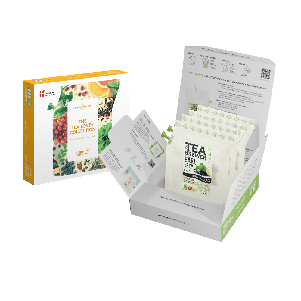 Tea packaging with a box and packets on a green background