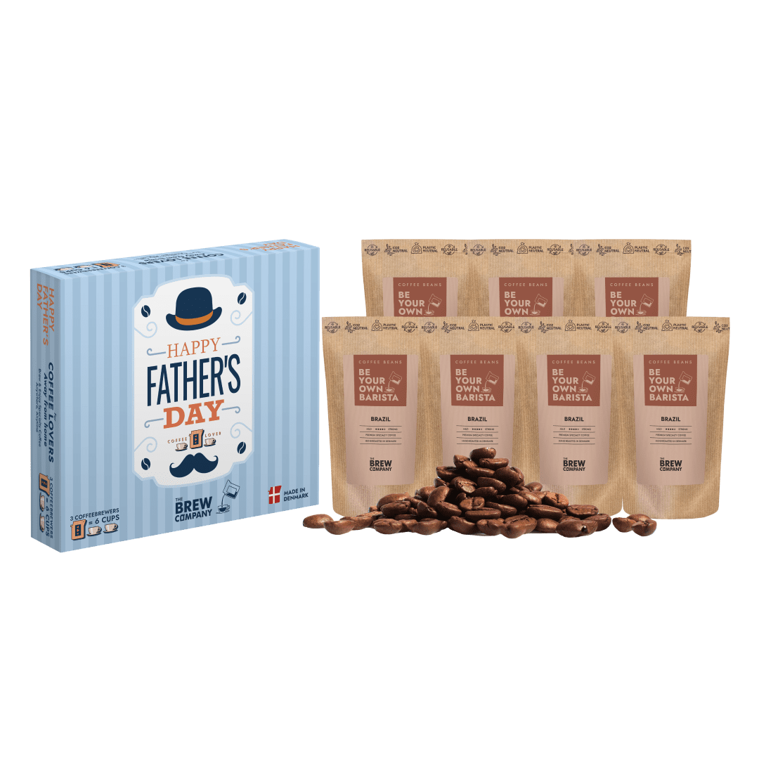 Father's Day coffee gift set with a blue box and coffee packages on a green background